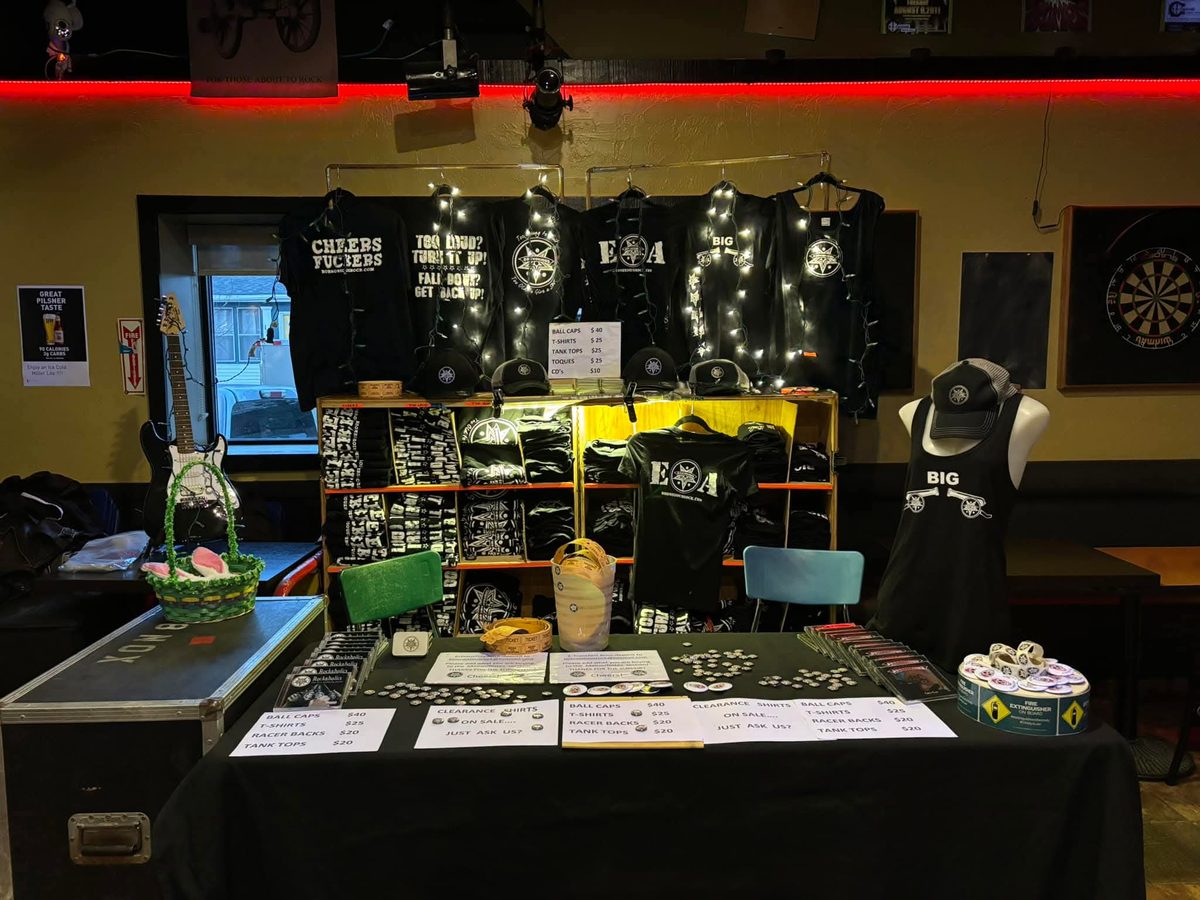 Bobnoxious merch table at a show